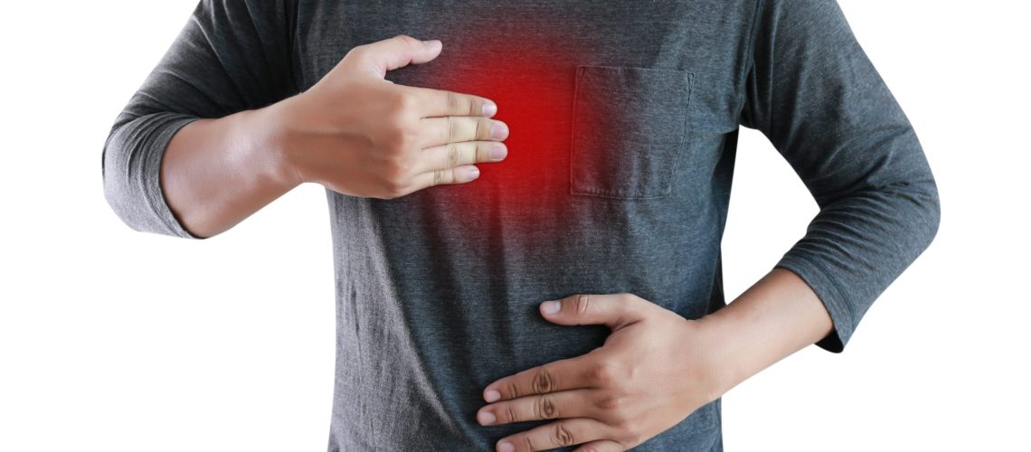 MAN with symptomatic acid reflux , suffering from acid reflux