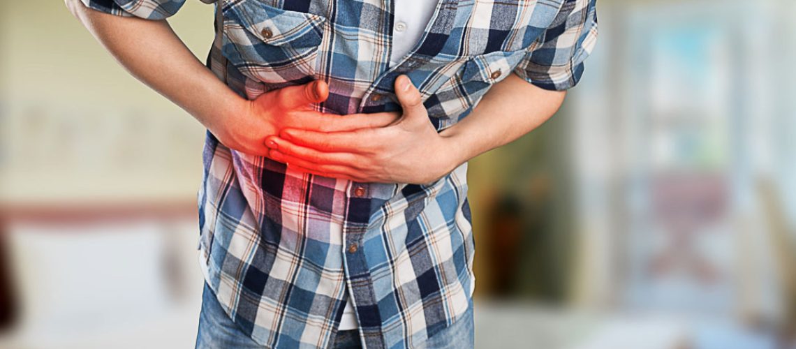 Man with stomach pain causes of abdominal pain include inflammatory bowel disease. stomach ulcer irritable bowel syndrome, ulcerative colitis and microvilli.