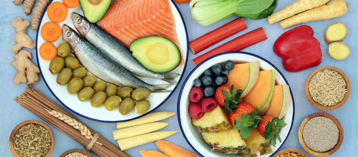 Health food to ease irritable bowel syndrome. Healthy foods high in antioxidants, protein, dietary fiber, vitamins, minerals, omega 3, protein, smart carbs & anthocyanins. Flat lay.